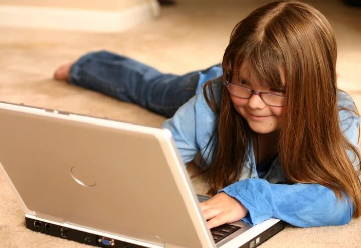 Little girl on laptop